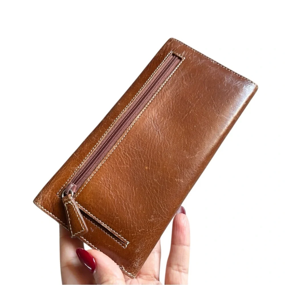TUSK genuine leather brown wallet beautiful cherry red interior 7.5” x 3.5” used